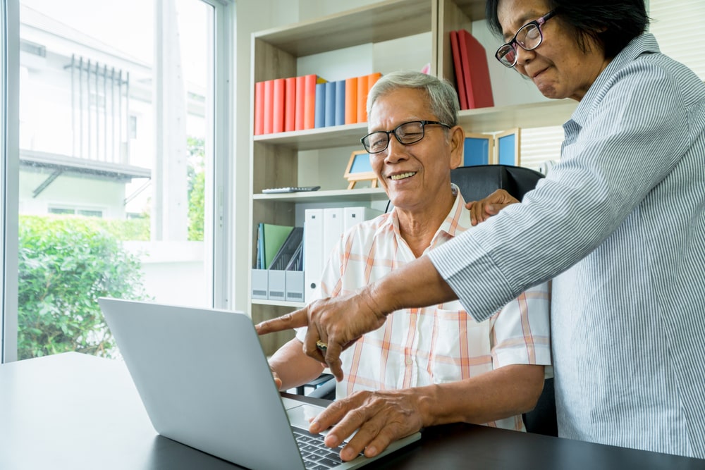 seniors using laptop